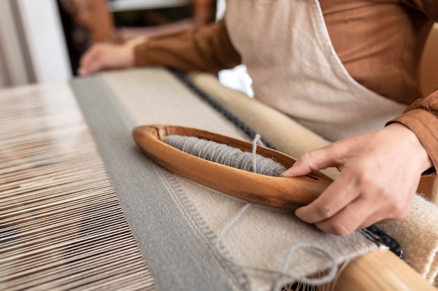 Person working in an embroidery workshop