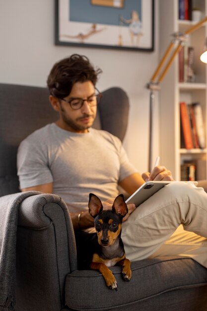 Person working from home with pet dog