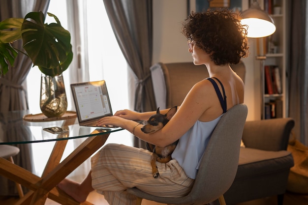 Person working from home with pet dog