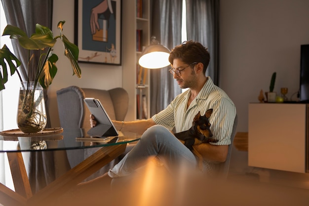 Person working from home with pet dog