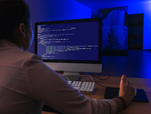 Person working html on computer