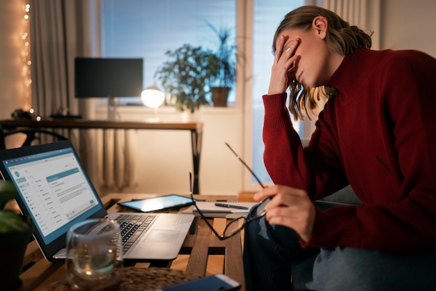 person at working late at night from home
