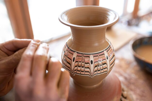 Person working in a pottery workshop