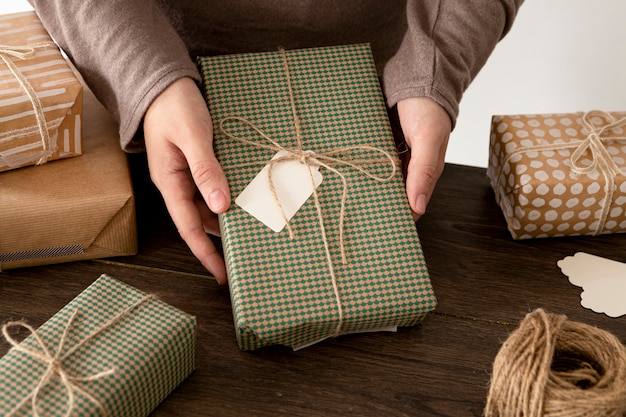 Person wrapping a christmas gift