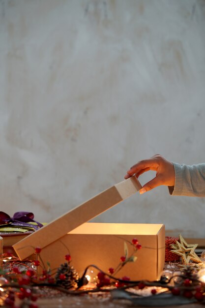 Person wrapping Christmas present