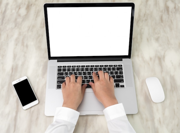 Person writing on a laptop