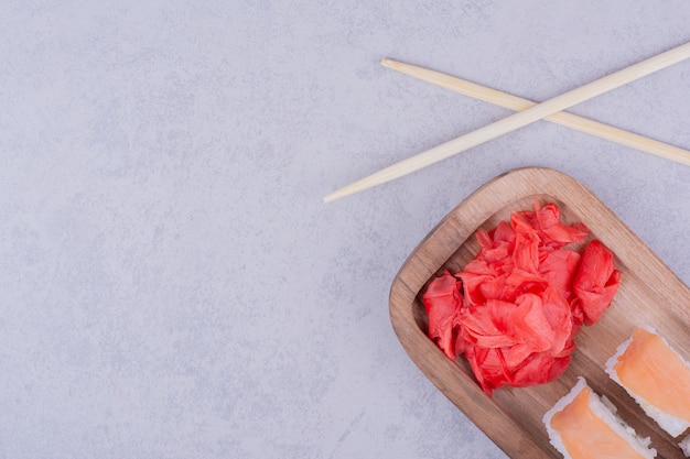 Philadelphia rolls with salmon and red marinated ginger.