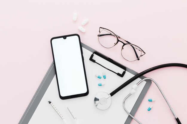 Phone and clipboard on desk