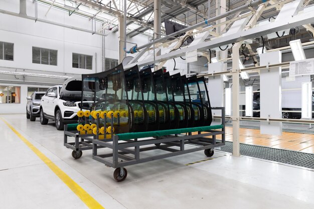 Photo of automobile production line Welding car body Modern car assembly plant Auto industry Interior of a hightech factory modern production