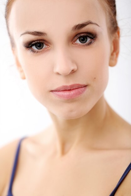 Photo of beautiful ballerina on white background