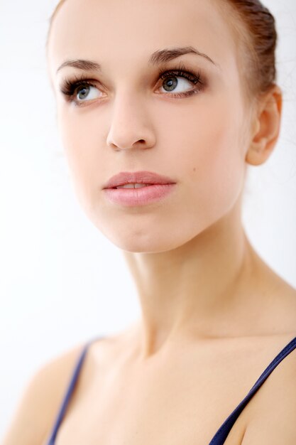 Photo of beautiful ballerina on white background