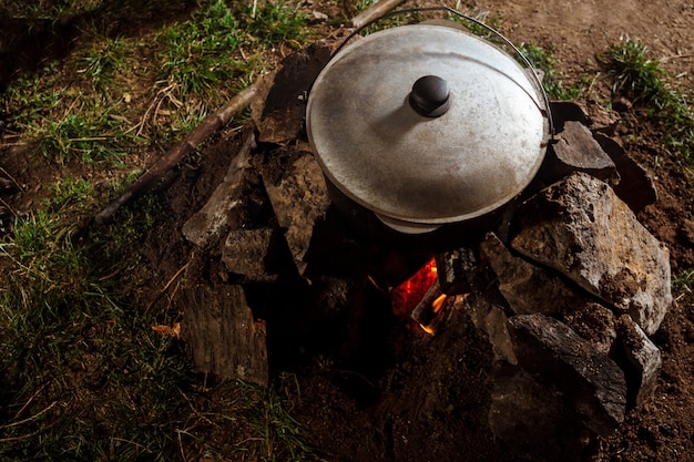 Free photo photo of cauldron on bonfire