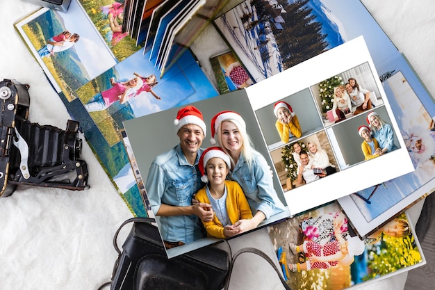 Free photo photo collage of nine images with winter concept. holiday season. open photo book with christmas photos