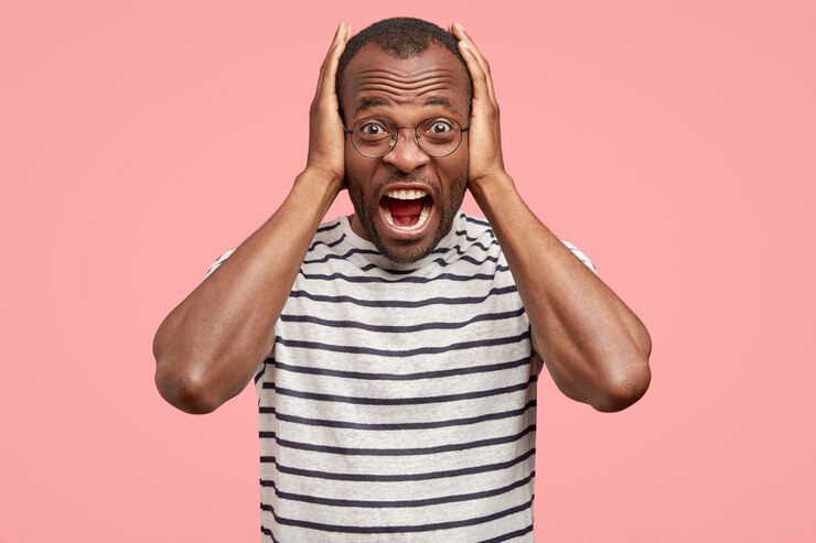 Free Photo photo of depressed angry dark skinned man being under pressure