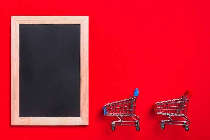 Free Photo photo frame and shopping trolleys 