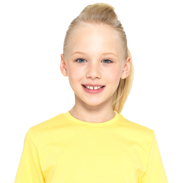 Photo of  a smiling young happy girl looking at camera isolated on white background