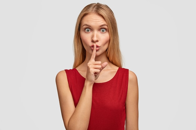photo of surprised mysterious blonde female with healthy skin