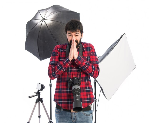 Photographer pleading over white background