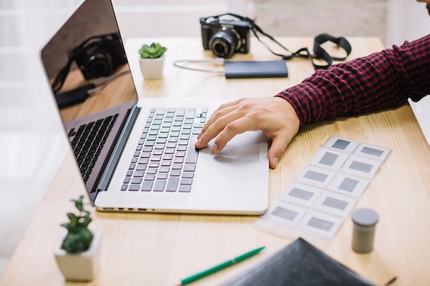 Photographer using laptop