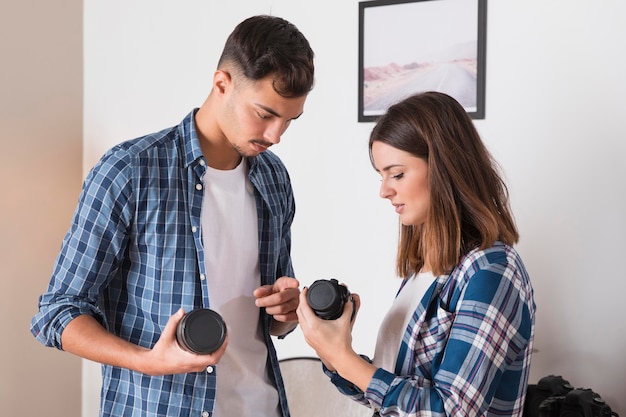 Photographers choosing their lens for a photo shooting