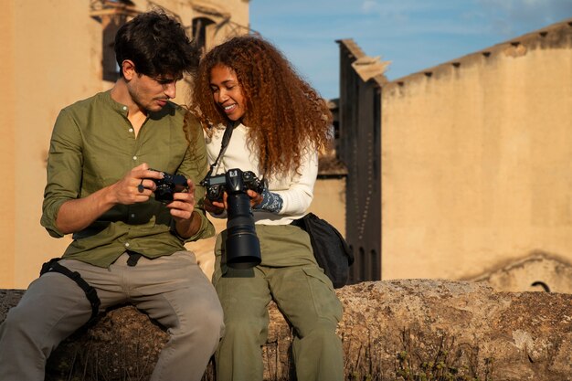 Free photo photographers exploring abandoned location