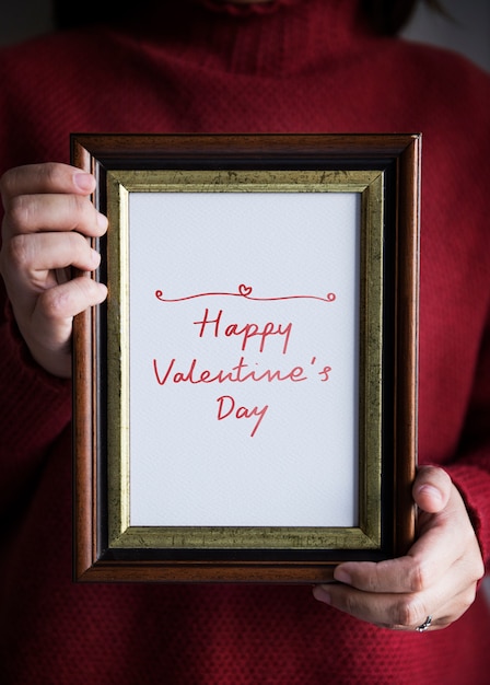 Free photo phrase happy valentine's day in a frame