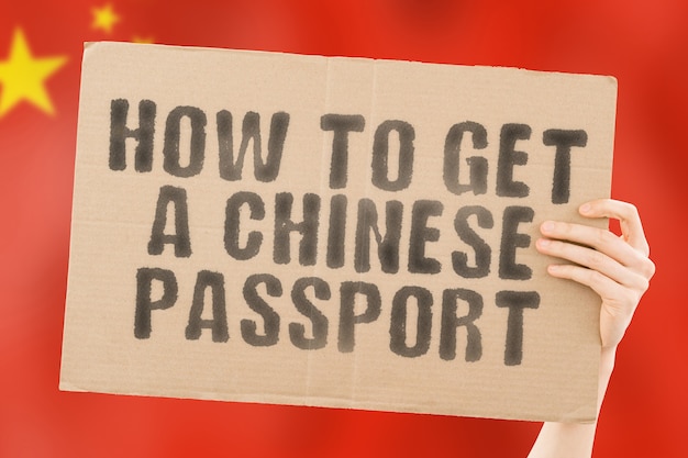 The phrase  how to get a chinese passport  on a banner in mens hand recognition personality