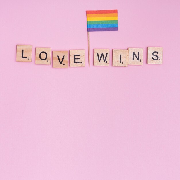 Phrase love wins and LGBT flag