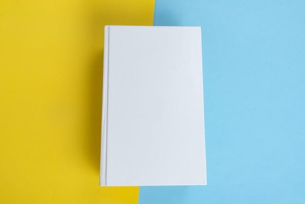 Free photo physical paper book over background closeup