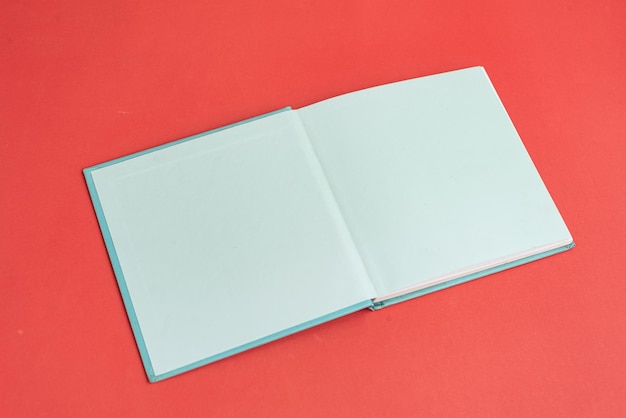 Free photo physical paper book over background closeup