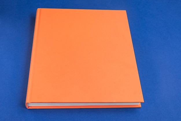 Free photo physical paper book over background closeup