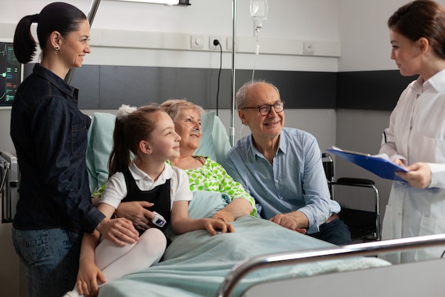 Physician doctor discussing sickness symptoms with retired elderly senior