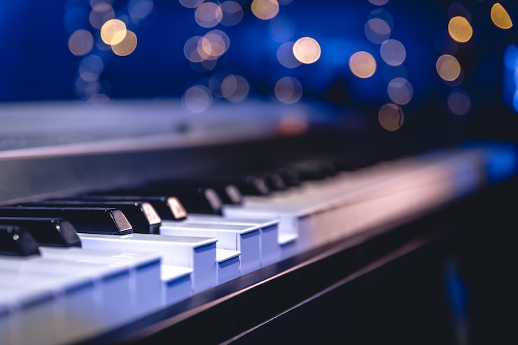 Free Photo piano keys closeup on a blurred background with bokeh