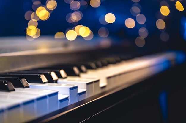 Piano keys closeup on a blurred background with bokeh