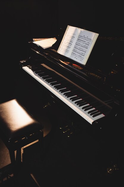 Piano with music book