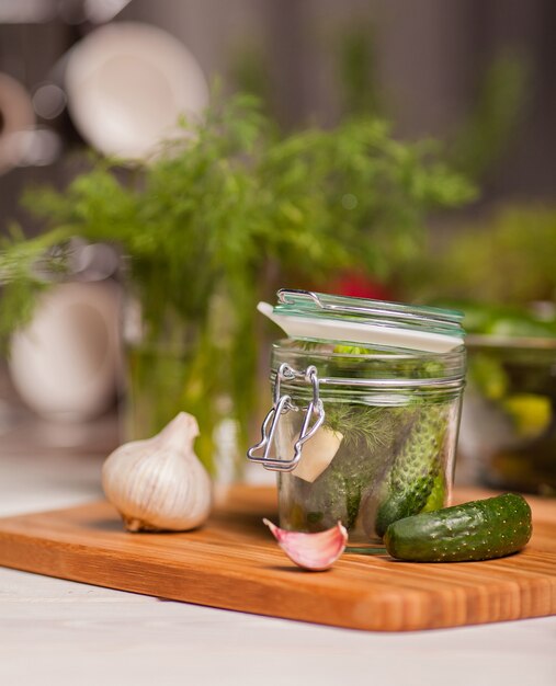 Pickled cucumbers in glass jar