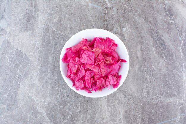 Pickled red cabbage in white bowl.