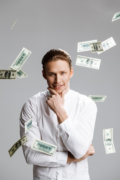 Picture of attractive caucasian man with money