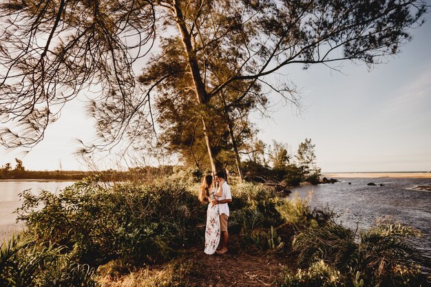 Picture of a beautiful couple against the greenery