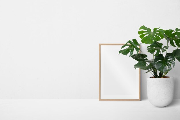 Picture frame leaning against a white wall