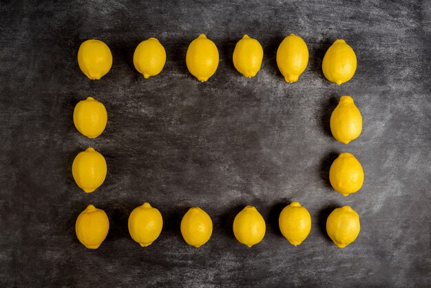 Free photo picture of lemons on grey surface