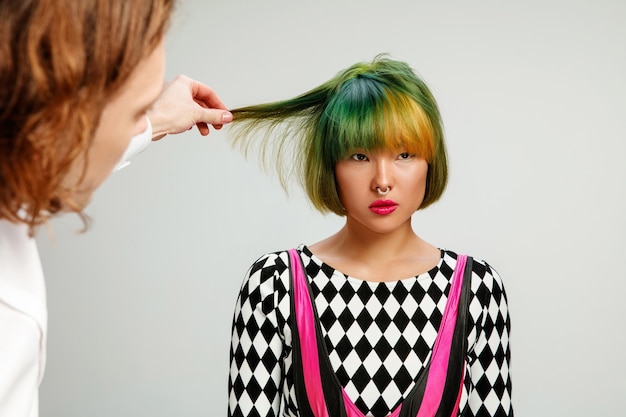 Picture showing adult woman at the hair salon.