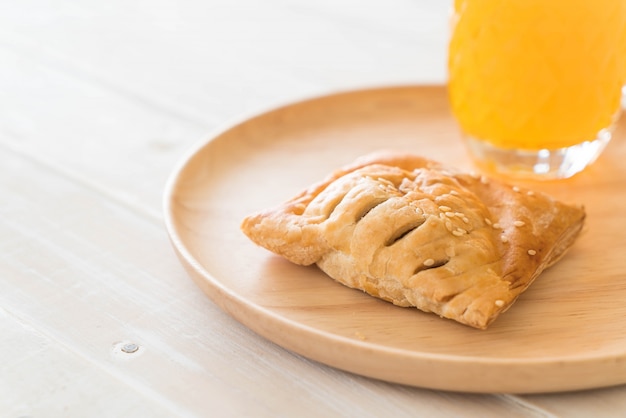 pie on wood plate