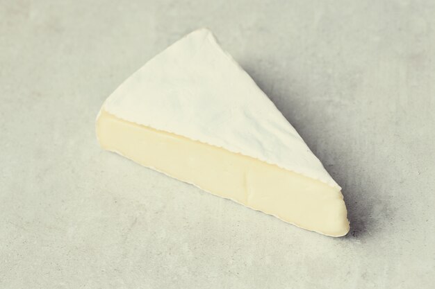 Free photo piece of camembert cheese