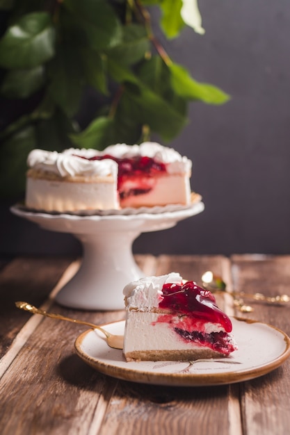 Piece of cherry pie with custard