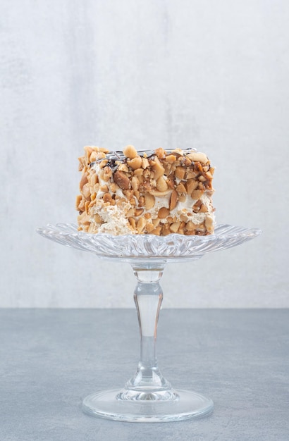 A piece of delicious cake on glass plate