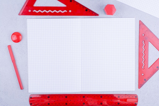 A piece of white blank paper with red rulers around