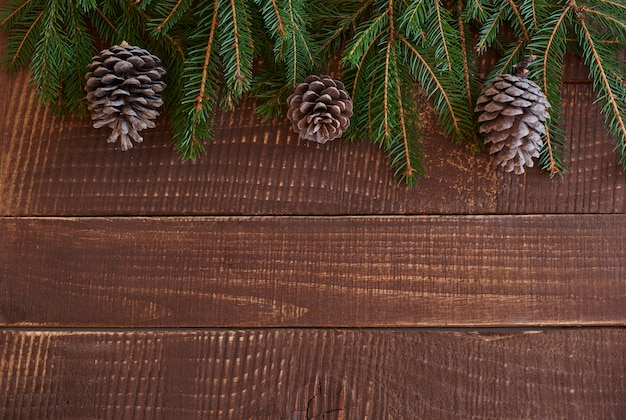 Free photo piece of wreath on the wooden plank