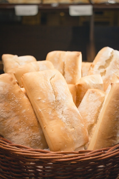 Pieces of bread in a basket in the shop