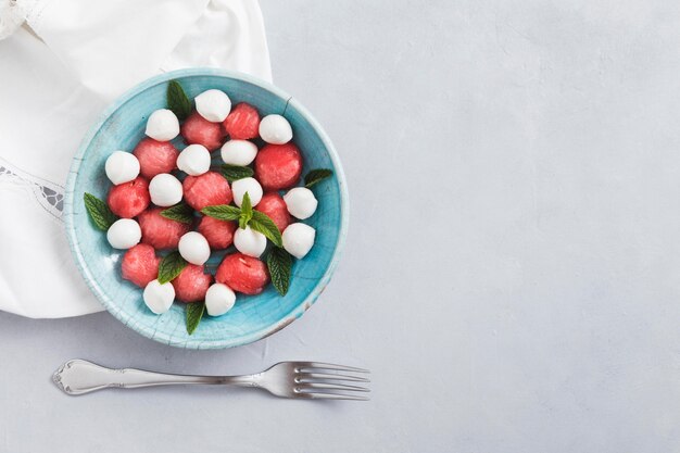 Pieces of watermelon and mozzarella flat lay